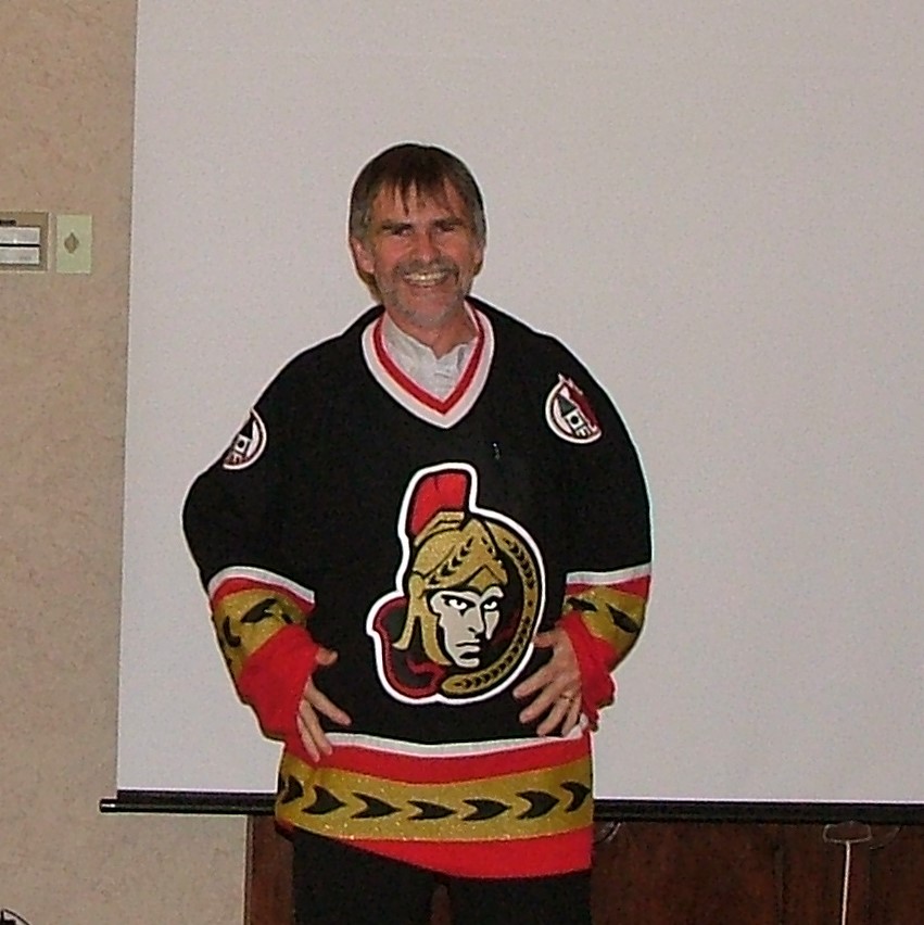 Dr. Duncan Stewart wearing an Ottawa Senators jersey.