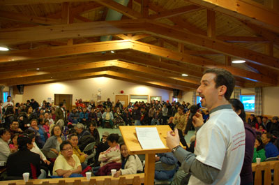 a person standing in front of a crowd of people