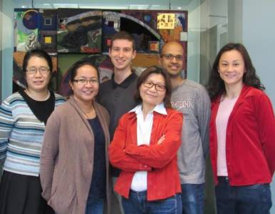 a group of people standing in a room