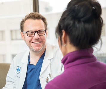 A doctor talking to a patient