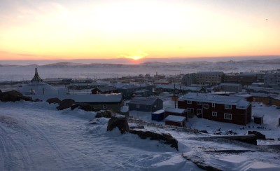 a snowy sunset in the town of Iqaluit