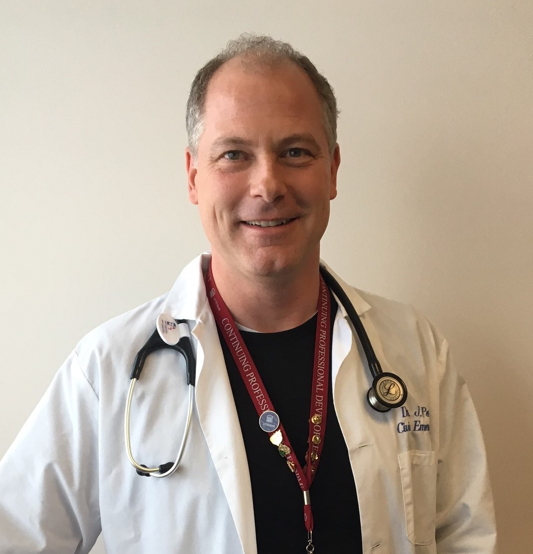 a person in a white coat