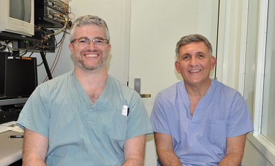 two people sitting in a hospital room