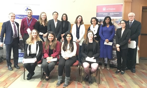 a group of people posing for a photo