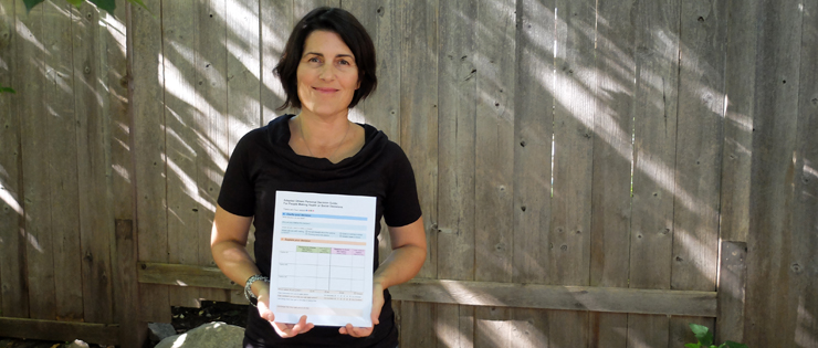 a person holding a certificate in their hands