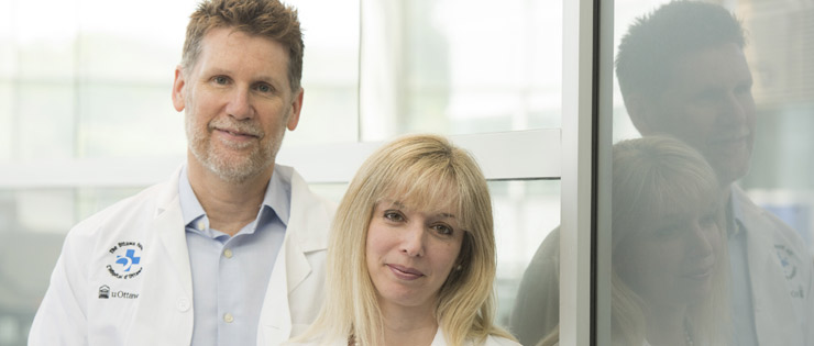 a person and person standing in front of a window