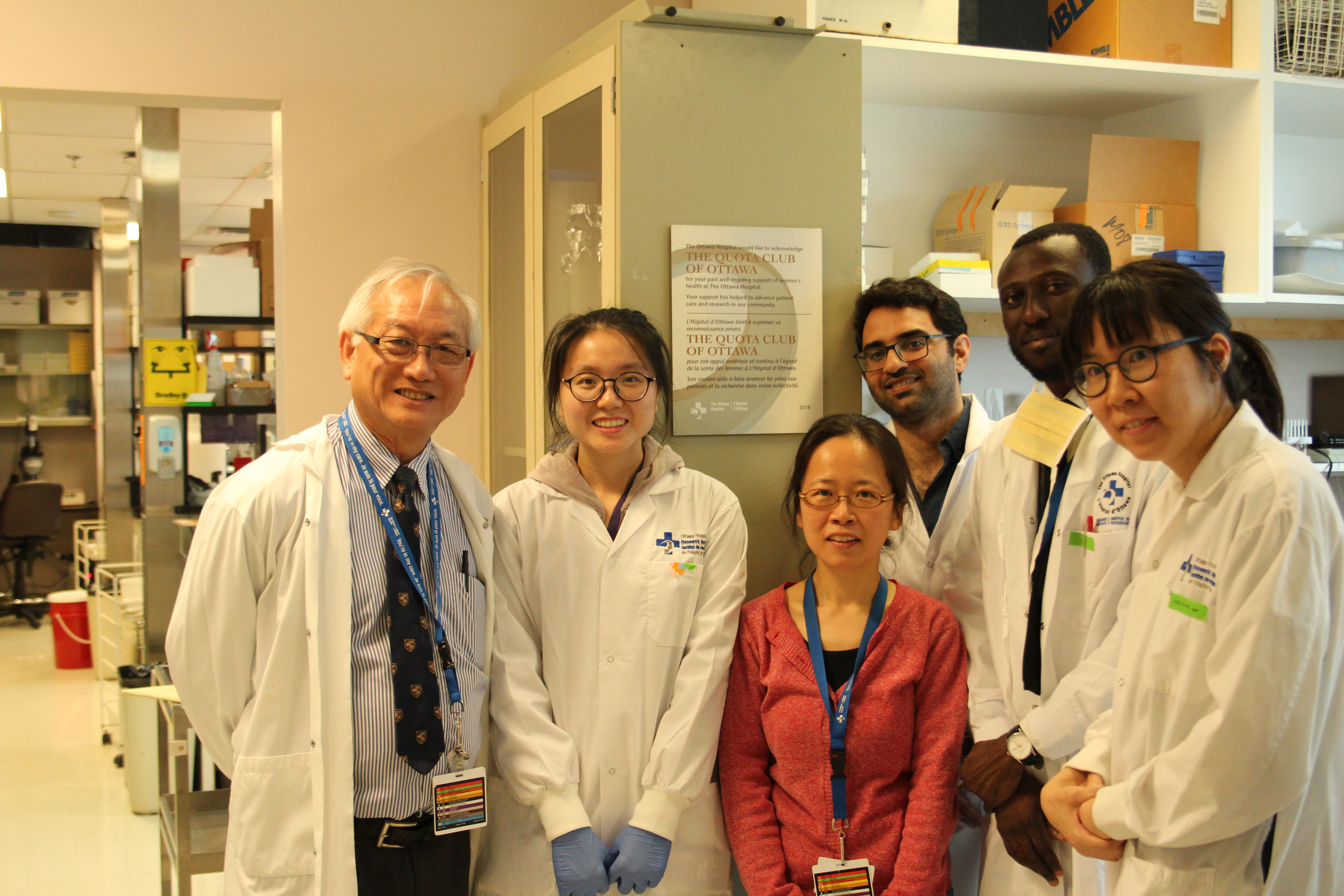 Group of individuals in a laboratory environment