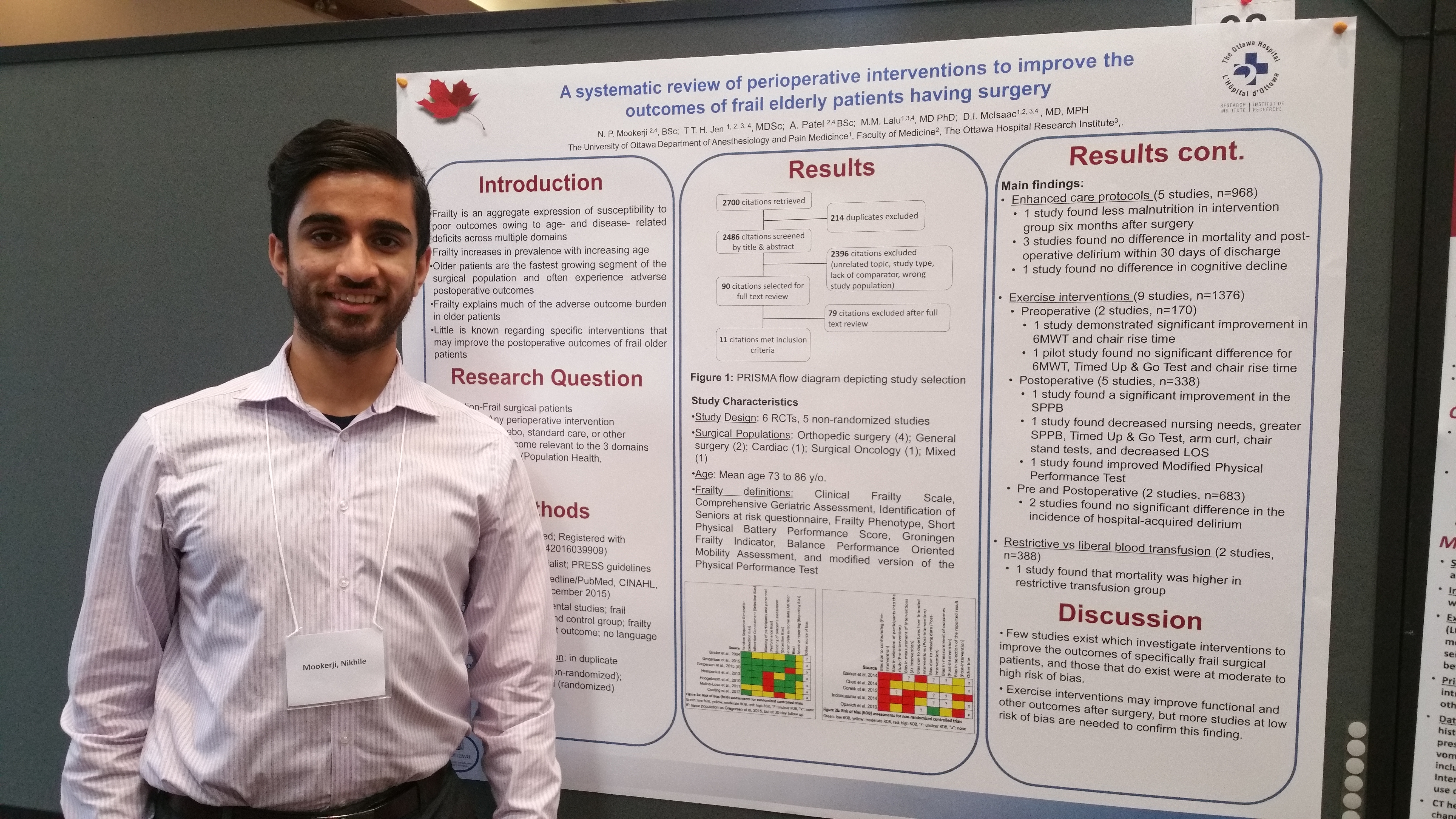 Person standing beside a poster