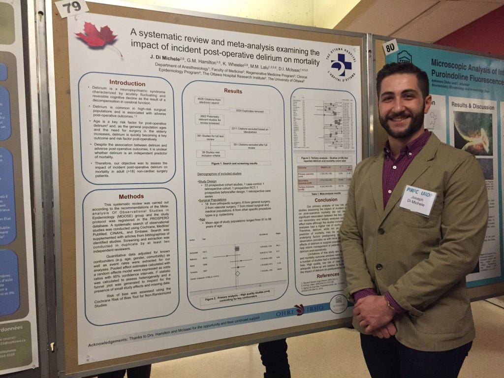 Person standing beside a poster