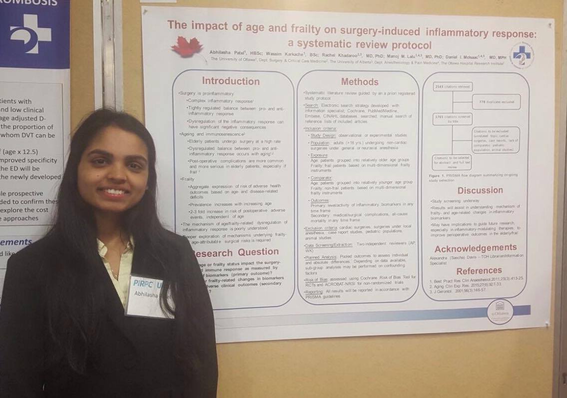 Person standing beside a poster