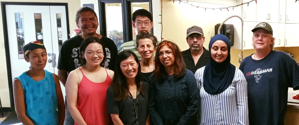 Group picture of people in a friendly setting