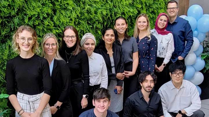 A group of people smiling