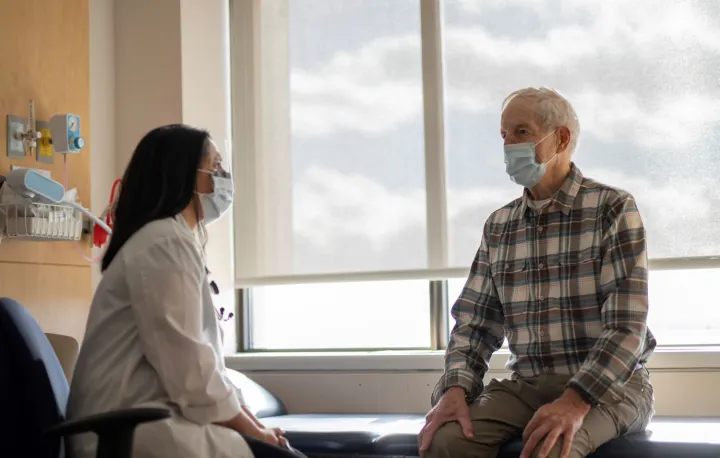 Doctor and a patient in an exam room
