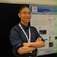 Portrait of a man folding his arms