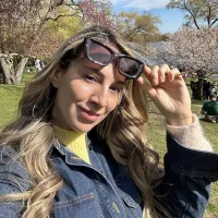 Admiring cherry blossoms in Hide Park (Toronto) in my first year living in Canada