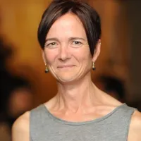 A woman smiling
