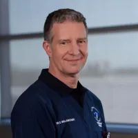 Man smiles at camera