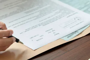  Medical professional with clinical trial documents.