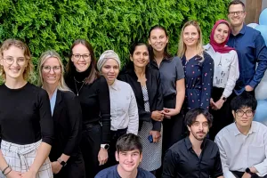 A group of people smiling