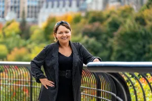 A woman stands outside