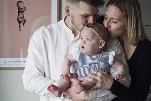 Two parents with a baby