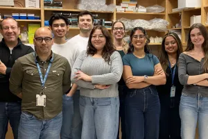 Researchers stand in a lab