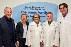 Five people standing in front of a sign for the Jones Family Kidney Research Centre
