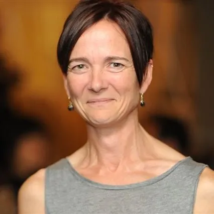 A woman smiling