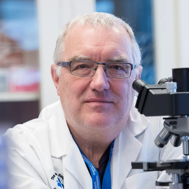 A man with a microscope