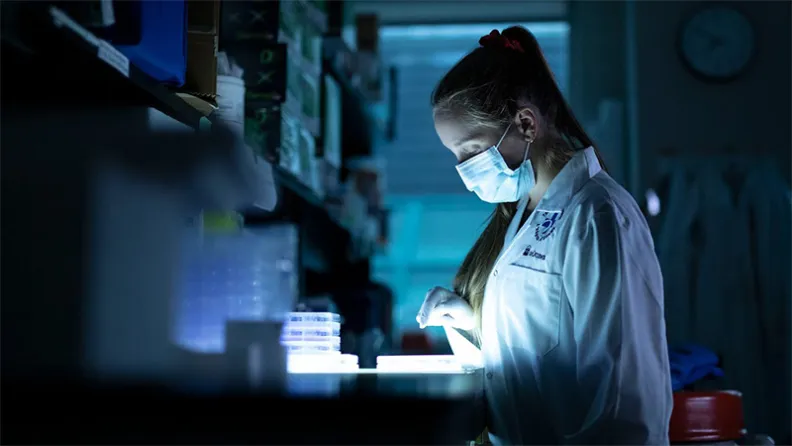 HIV researcher in a lab.