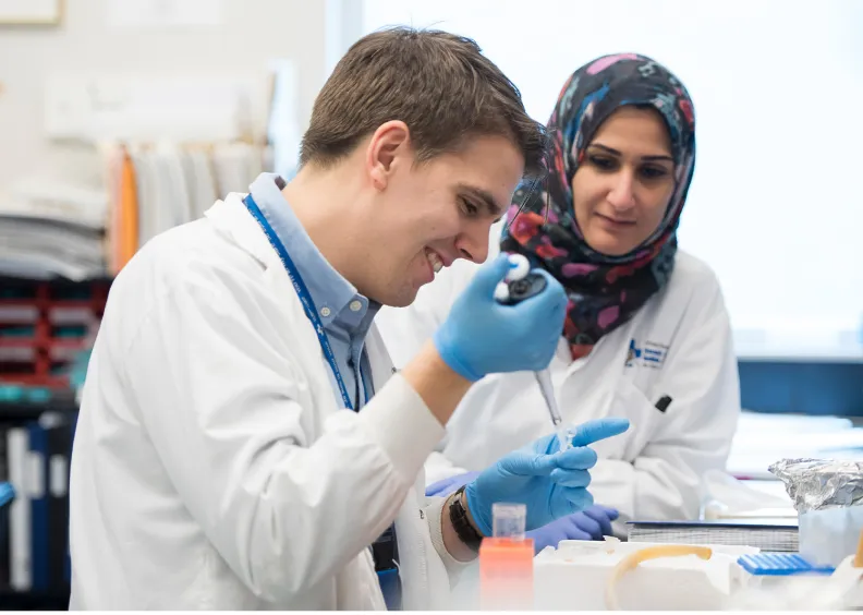 Two people working in a lab