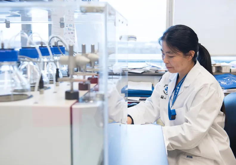 A woman works in a lab